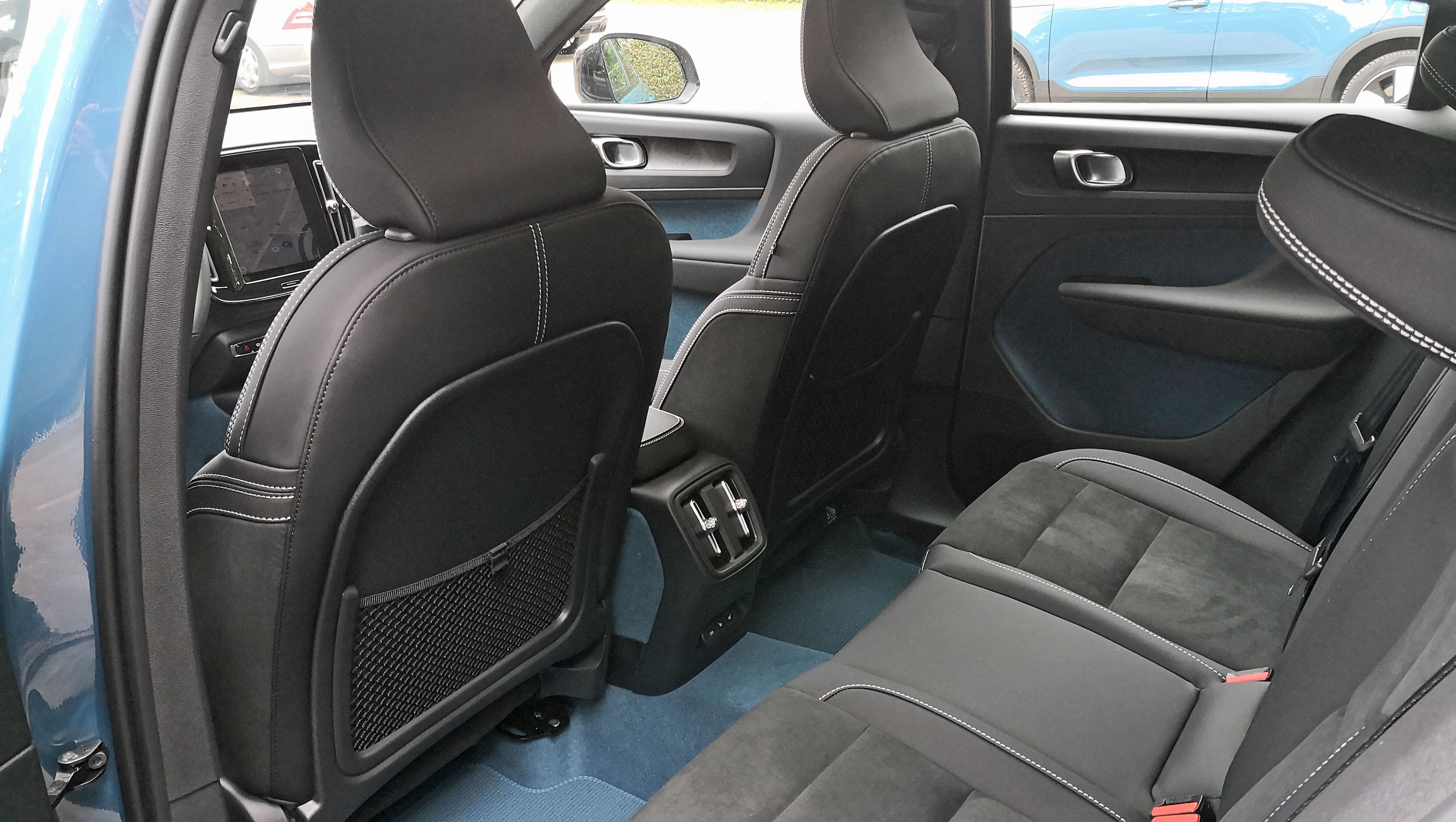 View of the rear seats from an open door of the Volvo C40 Recharge