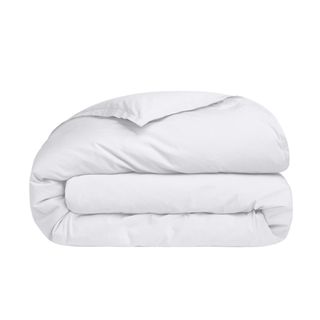 A folded white cotton duvet cover with three layers