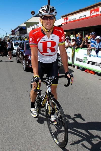 Lance Armstrong rolls into the sign on.