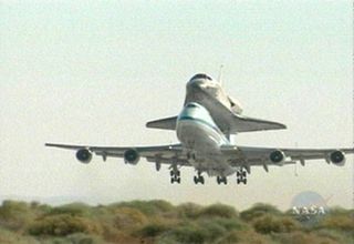 Space Shuttle Discovery Heads Back to Florida Spaceport