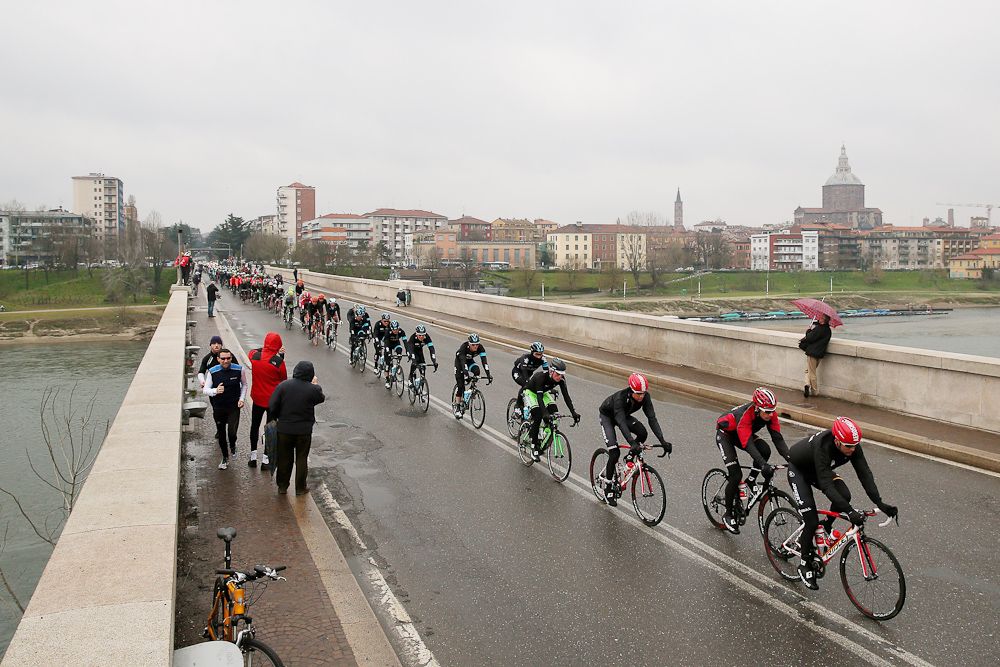 The Peloton crosses a bridge on the way to San Remo.
