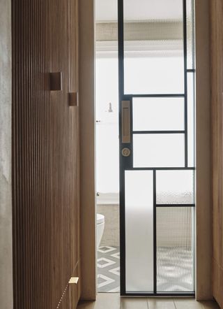bathroom with sliding glass pocket door