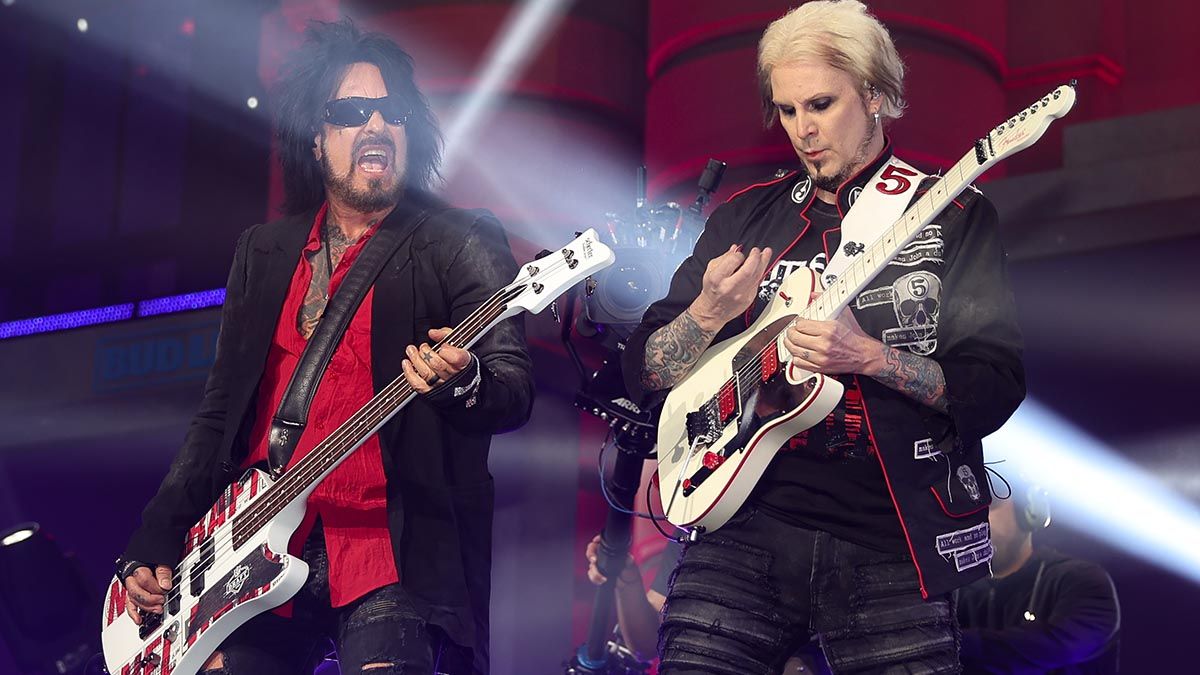 Mötley Crüe&#039;s Nikki Sixx (left) and John 5 onstage in Kansas