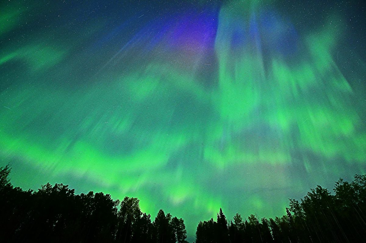 Aurora outburst above Fox Creek, Alberta, Canada captured by photographer and stormchaser Jo Majko.