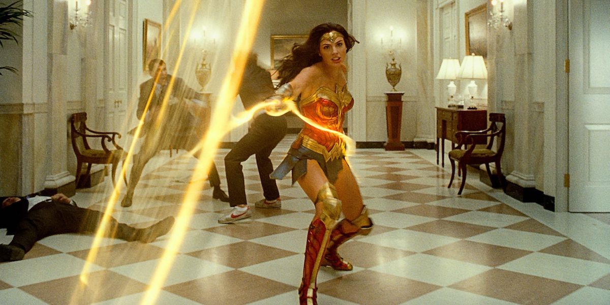 Gal Gadot as Wonder Woman in WW84 swinging lasso