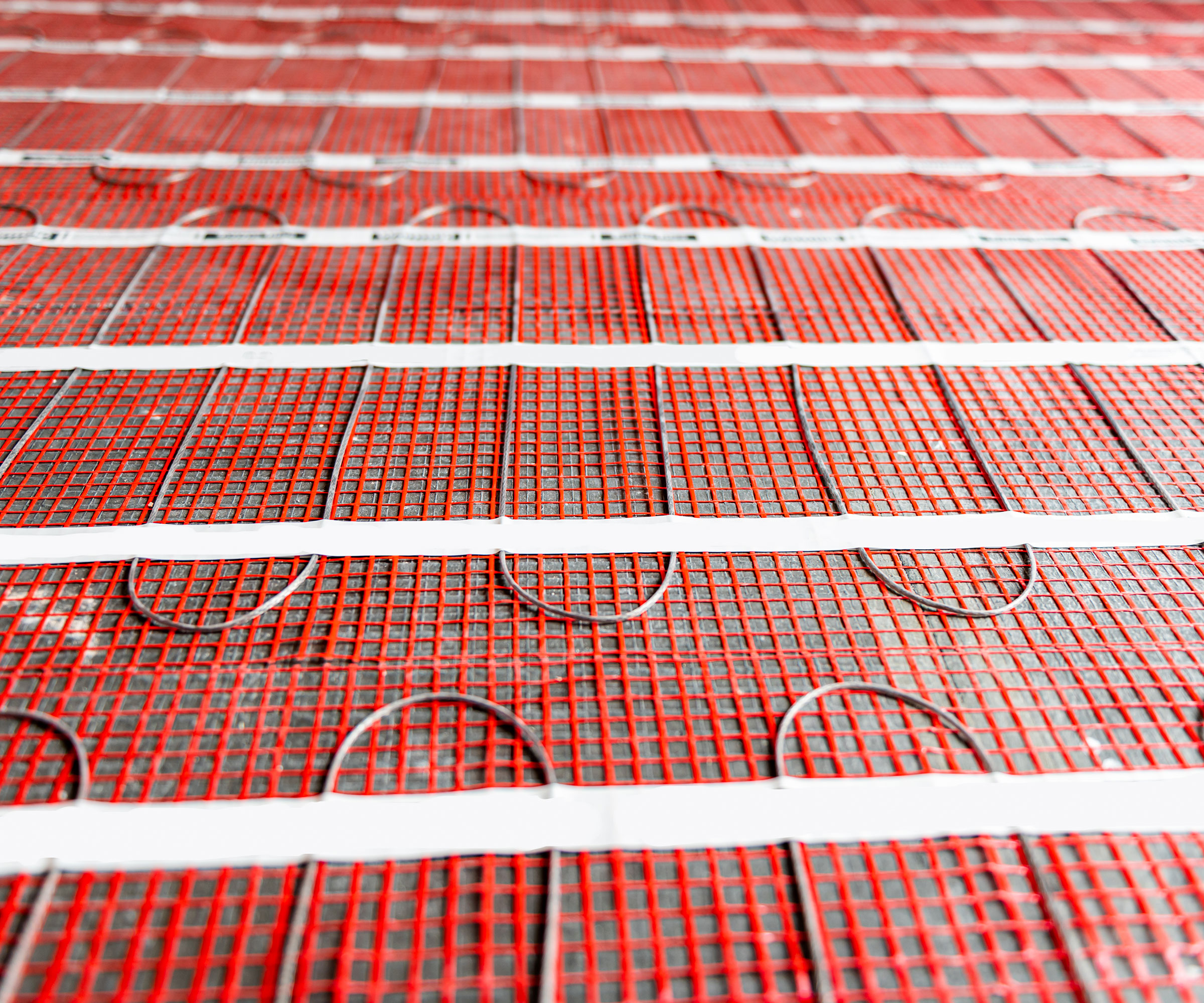 electric underfloor heating mat during installation