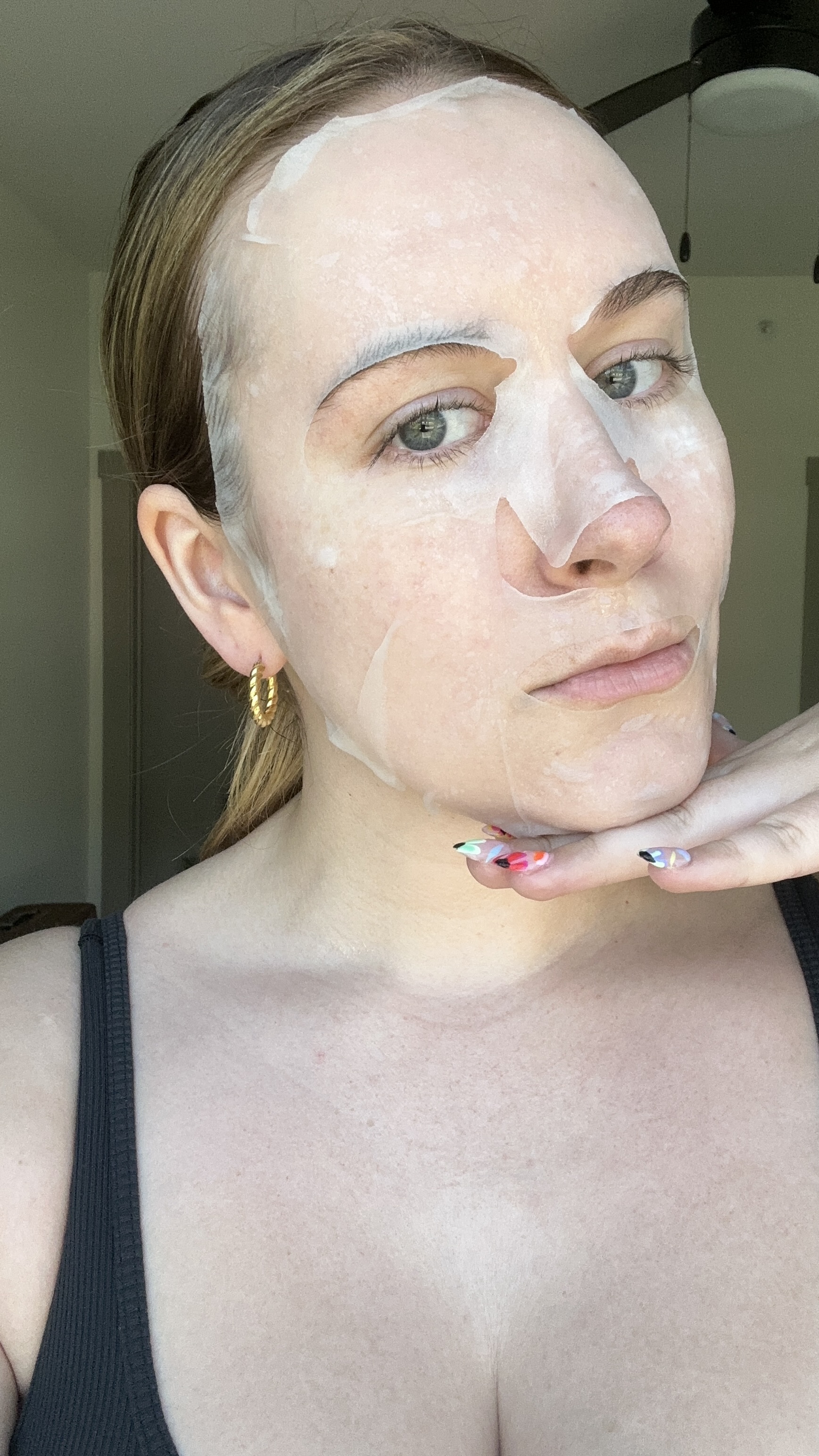 Photo of Kaitlyn McLintock wearing the ESW sheet mask