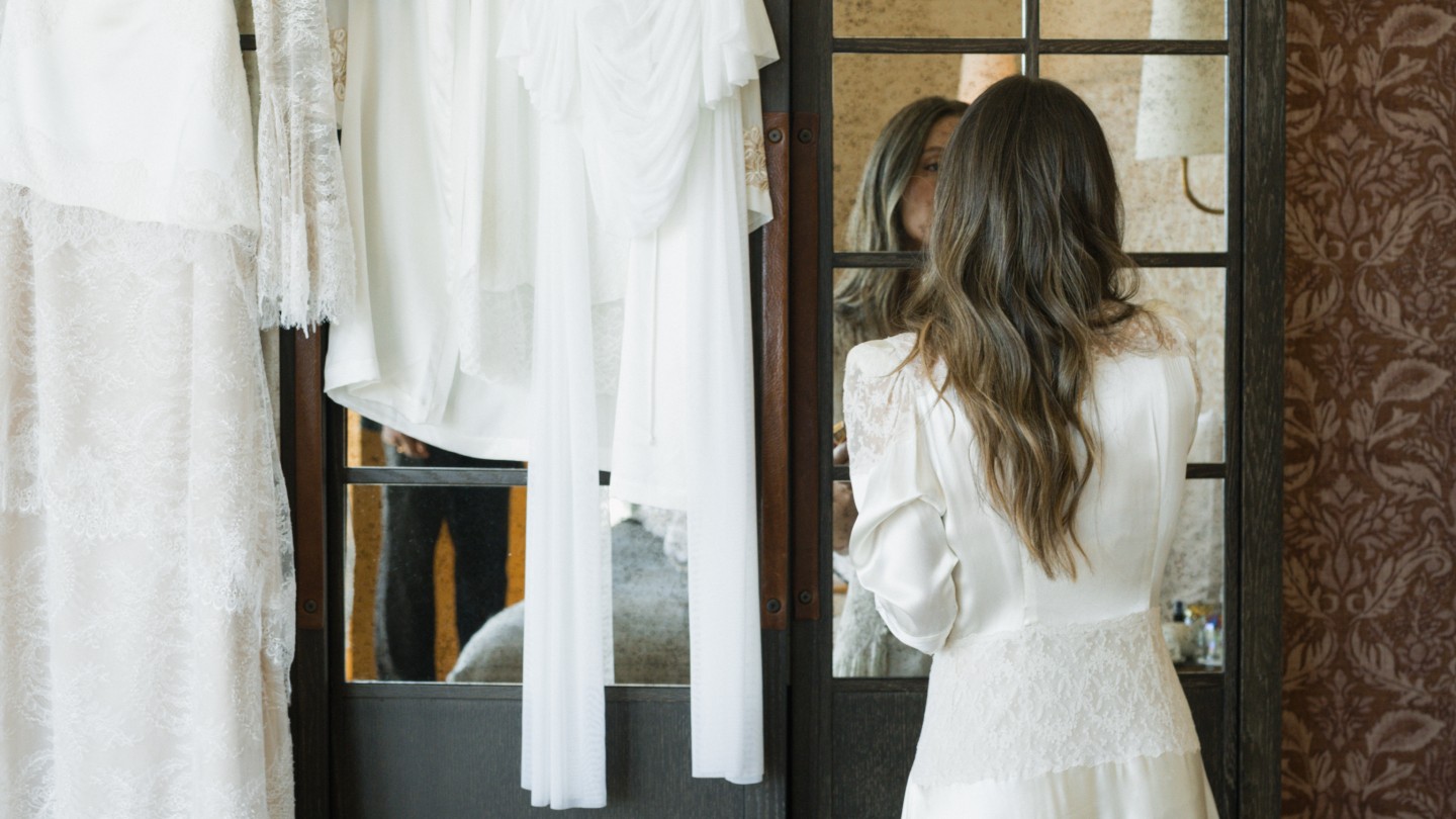 Photo of Jamie Schneider getting ready for her wedding