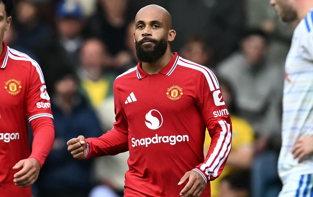 Manchester United's Cameroonian midfielder #19 Bryan Mbeumo celebrates scoring the opening goal during the English Premier League football match between Leeds United and Manchester United