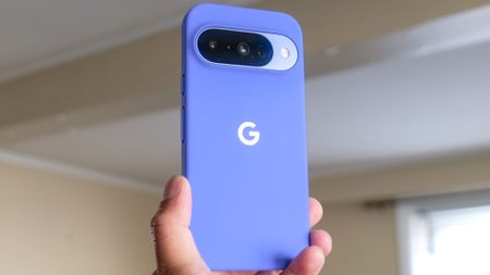 Google Pixel 10 in the hand.