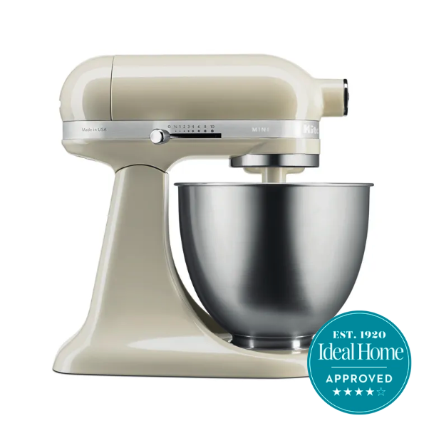 A cream KitchenAid mixer with a blue Ideal Home 5 star approved badge