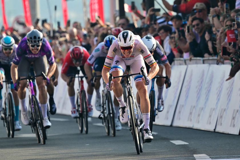 Soudal Quickâ€“Step&#039;s Belgian cyclist Tim Merlier (R) finishes to win the sixth stage the UAE Cycling Tour UCI 2025 in Abu Dhabi on February 22, 2025. (Photo by Giuseppe CACACE / AFP)