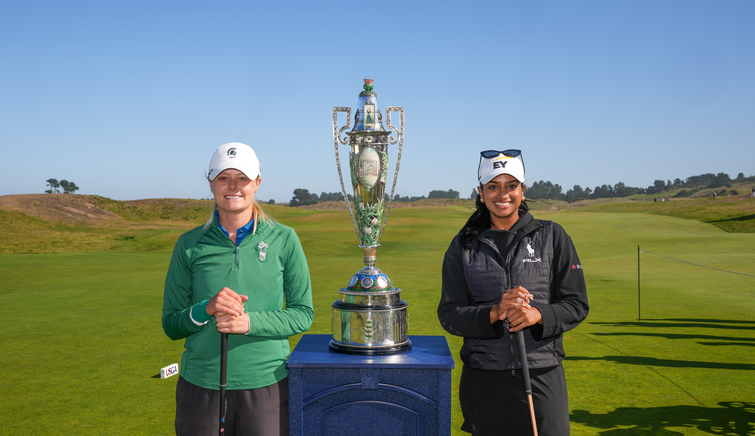 Brooke Biermann and Megha Ganne pose next to the U.S. Women&#039;s Amateur trophy