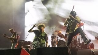Tim Commerford, Zack de la Rocha and Tom Morello of Rage Against the Machine perform at Madison Square Garden