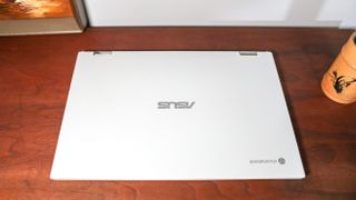 Asus Chromebook Flip CX5 (2022) sitting on desk with lid closed, facing camera