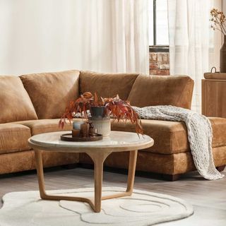 Barker and Stonehouse Terza Coffee Table in a living room with a corner leather sofa