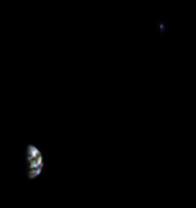 Black and white image of Earth, quite blurred.