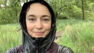 Julia Clarke hiking in the OutDry Extreme™ Mesh Waterproof Hooded Shell Jacket Out