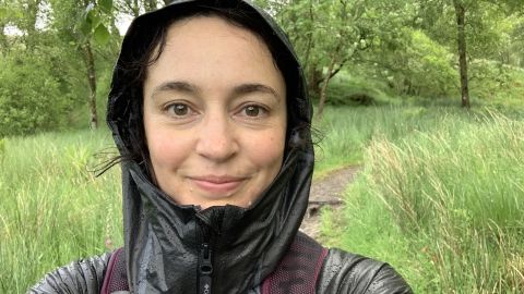 Julia Clarke hiking in the OutDry Extreme Mesh Waterproof Hooded Shell Jacket Out