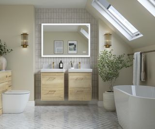 Two-drawer oak vanity units in a bathroom with white sanitaryware