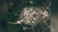 A SpaceX Falcon 9 rocket on the pad at Cape Canaveral Space Force Station on Jan. 12, 2022, one day before it launched on the 105-satellite Transporter-3 mission. This photo was captured from space by a SkySat satellite operated by the San Francisco-based company Planet.