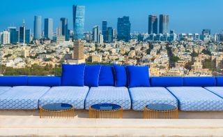 Outside area, floor style couch with view of city