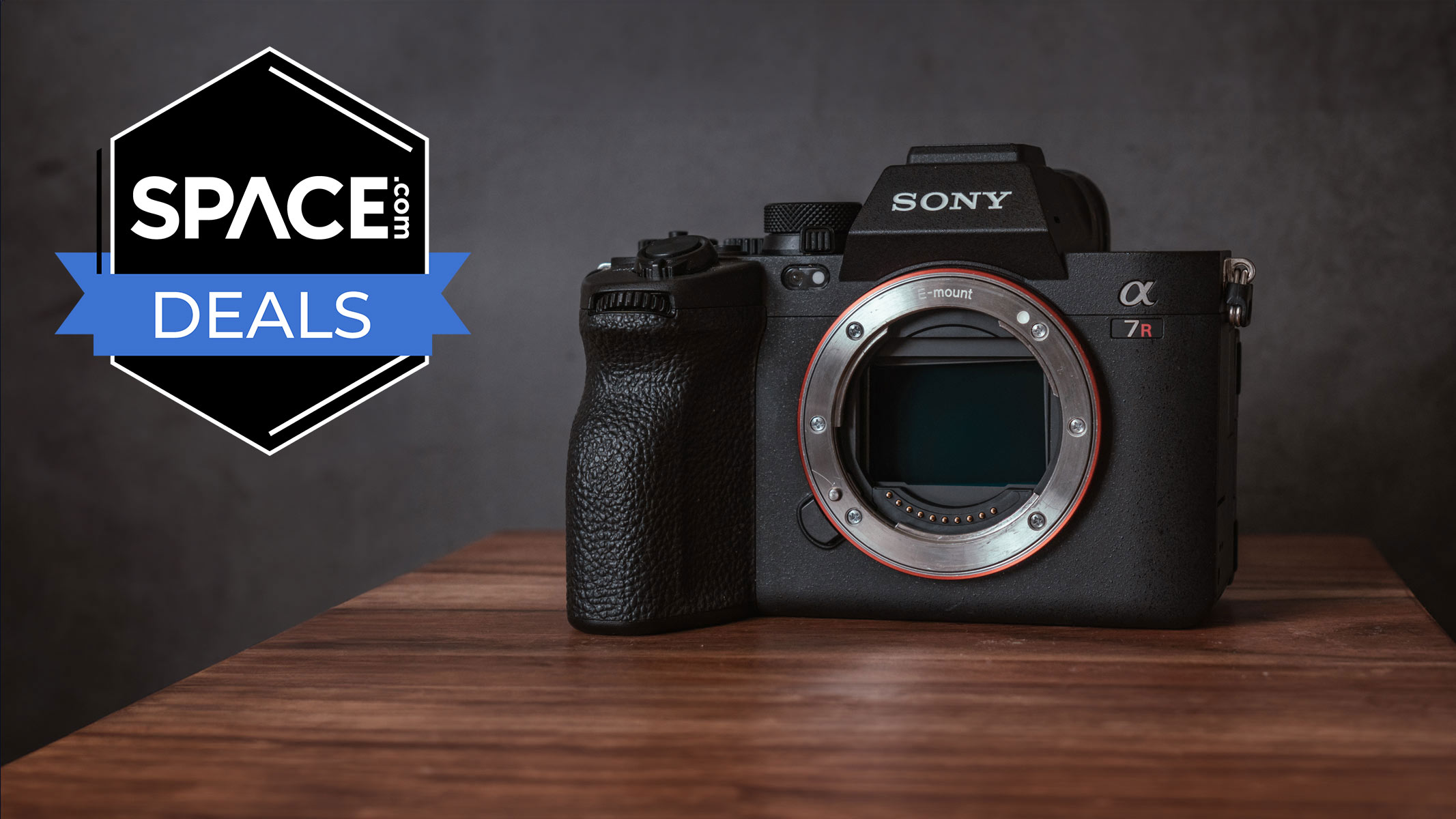 A Sony A7R V camera on a wooden table with a black Space.com deals badge in the upper left corner.