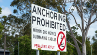 an anchoring prohibited sign near an undersea cable