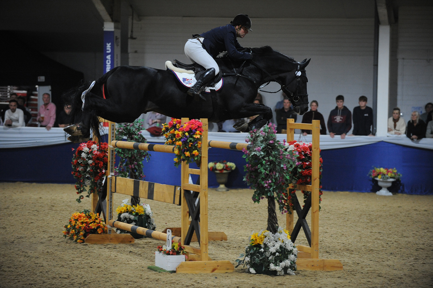 Robert Whitaker riding Vermento in the grand prix at the Arena UK Major Showjumping Championships