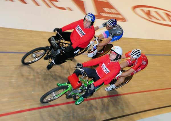 Danilo Hondo and Robert Barkto compete in the derny race.