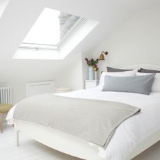 White loft bedroom with double bed