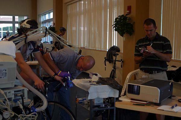 Team physiologist and trainer Steve Heal makes data recordings while Pat O&rsquo;Connor takes blood lactate readings