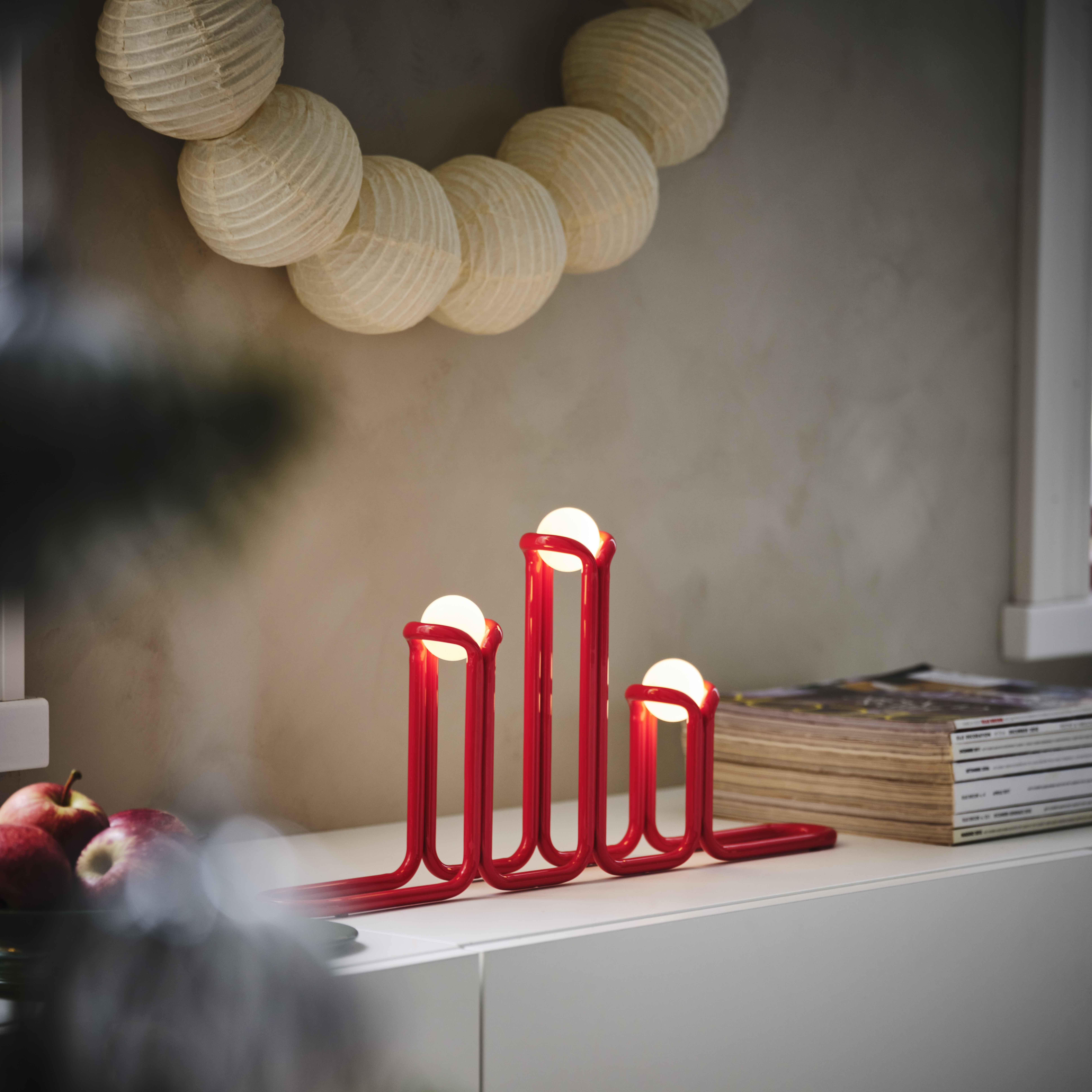 red candelabra with spherical LEDs