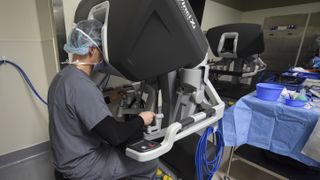 US Air Force surgeons are training with robots to perform operations remotely, and with greater precision.