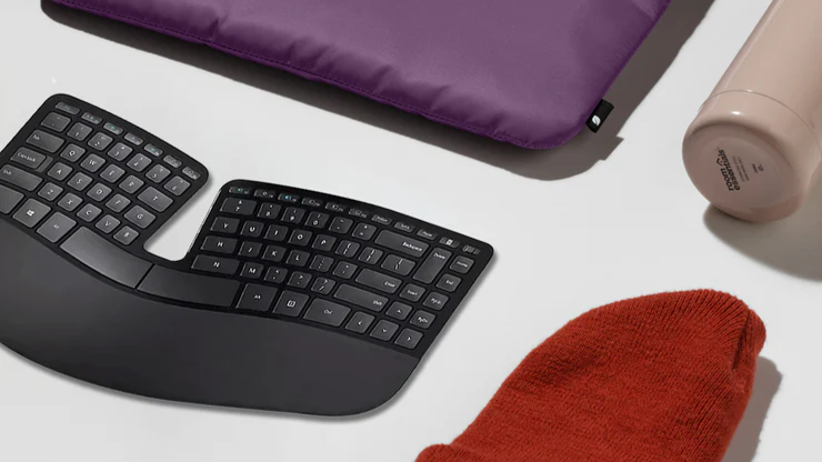 One of the Incase keyboards that was designed in collaboration with Microsoft next to other everyday objects