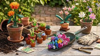 Collection of Lego Botanicals flowers and plants on a potting bench