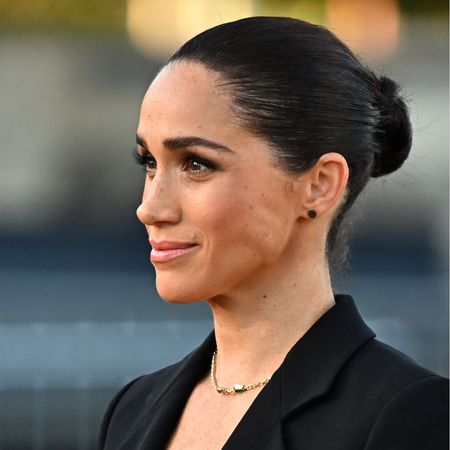 Meghan Markle in a black suit