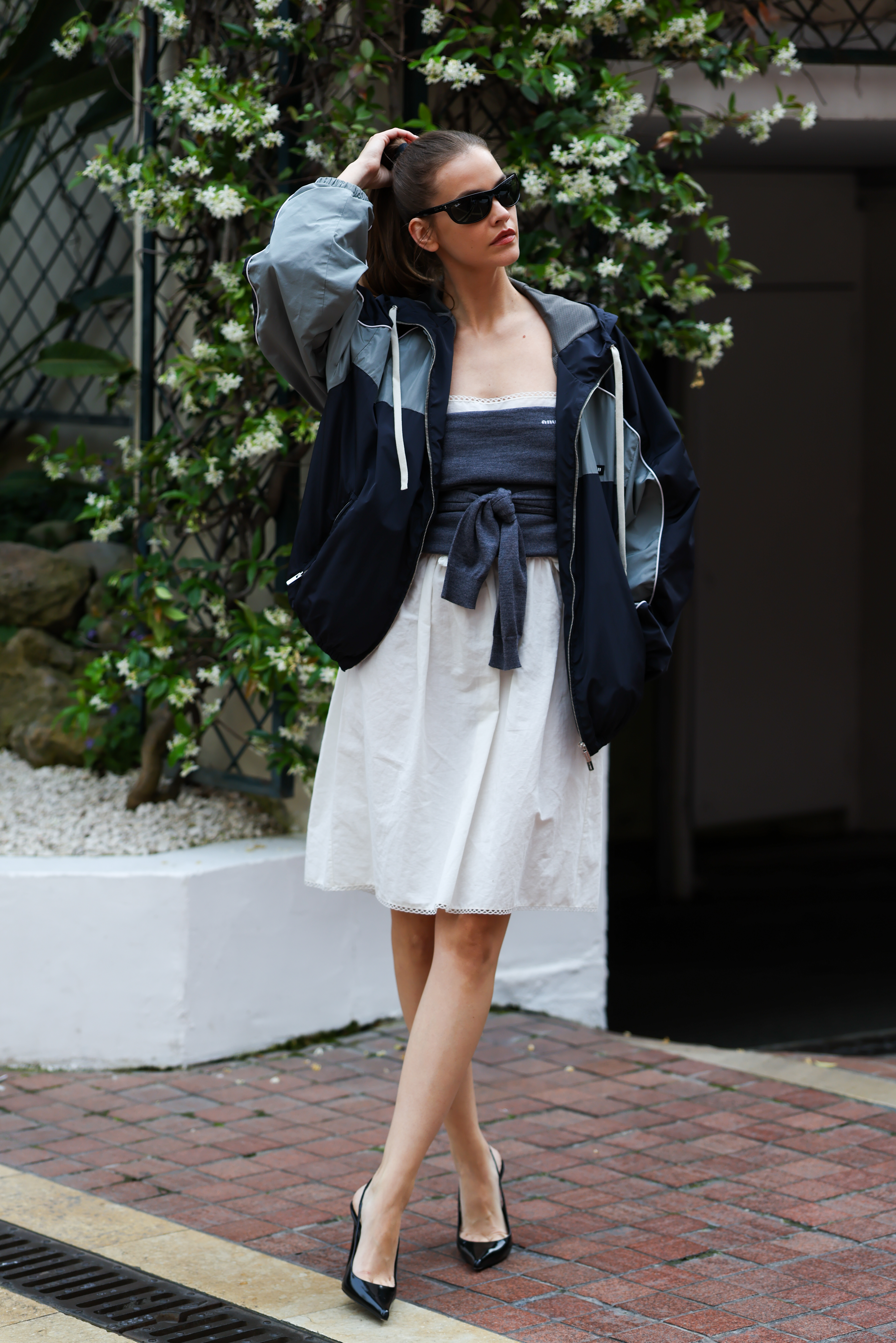 Barbara Palvin wearing a white midi skirt for the A-list Edit