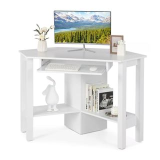 A white corner desk with shelves and a desktop shelf