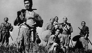 Seven Samurai lined up on a hill