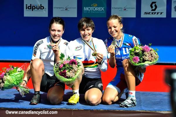 Lena Putz, Linda Indergand and Julia Innerhofer on the podium after the junior women's cross country race.