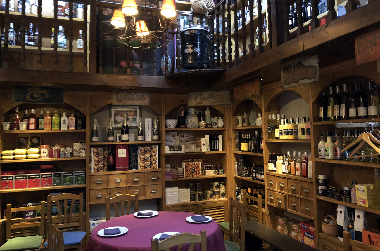 Wooden shelves packed with produce