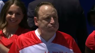 Joey Chestnut winning 2022 Nathan's Hot Dog Eating Contest