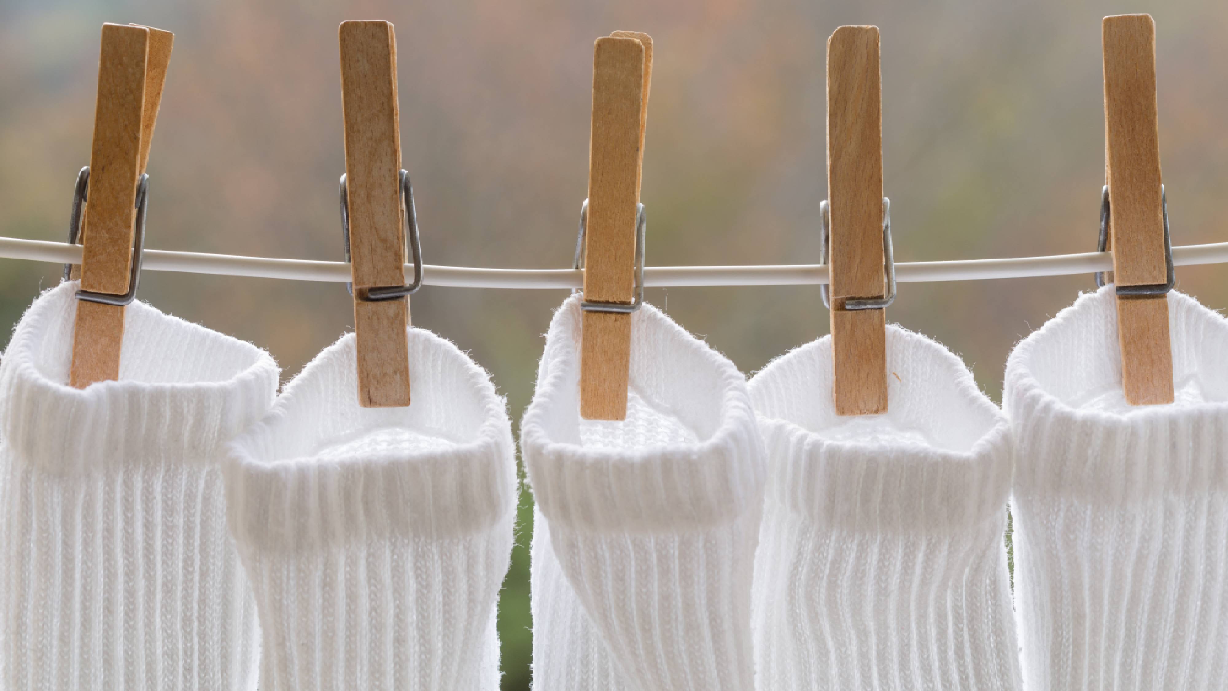 Bright white socks drying outside