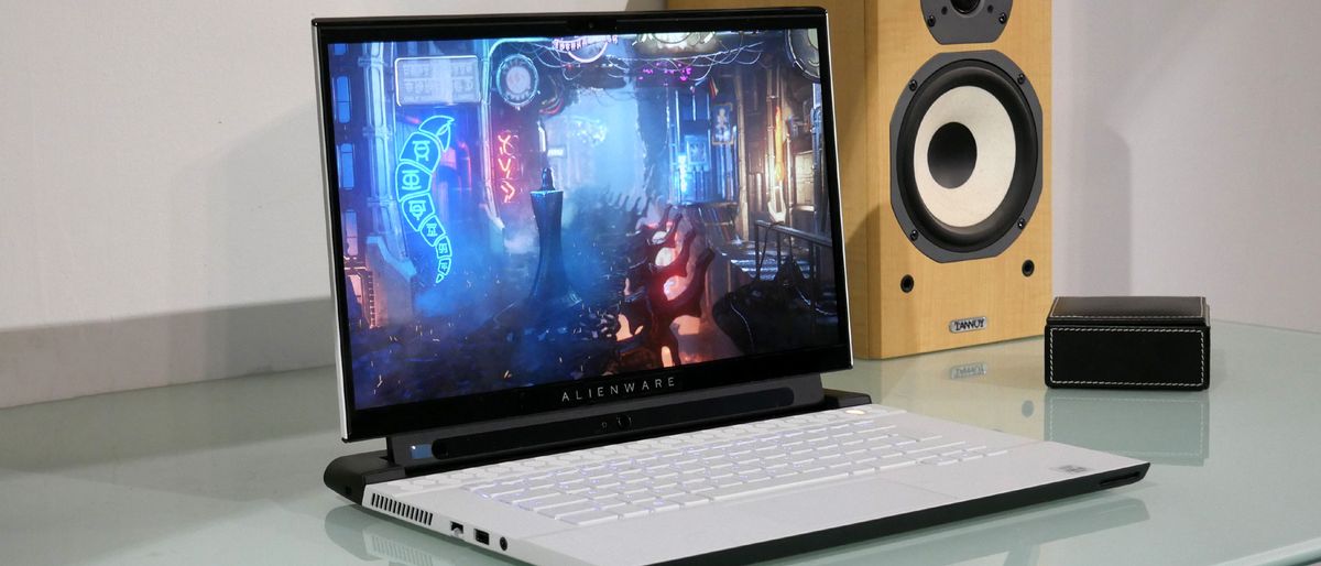 Alienware M15 R3 (2020) on a glass-top desk