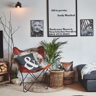 living room with chair and seagrass flooring carpet