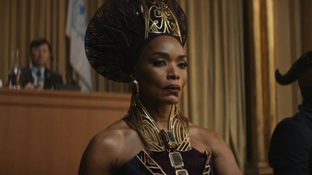 Angela Bassett's Queen Ramonda looking angry at a UN Hearing in Black Panther 2.