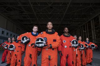 SPACE FORCE (L TO R) CHRIS GETHARD as EDDIE, OWEN DANIELS as OBIE, TAWNY NEWSOME as ANGELA ALI, HECTOR DURAN as JULIO, TAMIKO BROWNLEE as BRYCE BACHELOR, and AMANDA LUND as ANNA in episode 109 of SPAC
