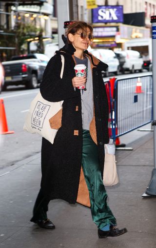 Katie Holmes is seen arriving to her Broadway play 'Our Town' on November 23, 2024 in New York, New York