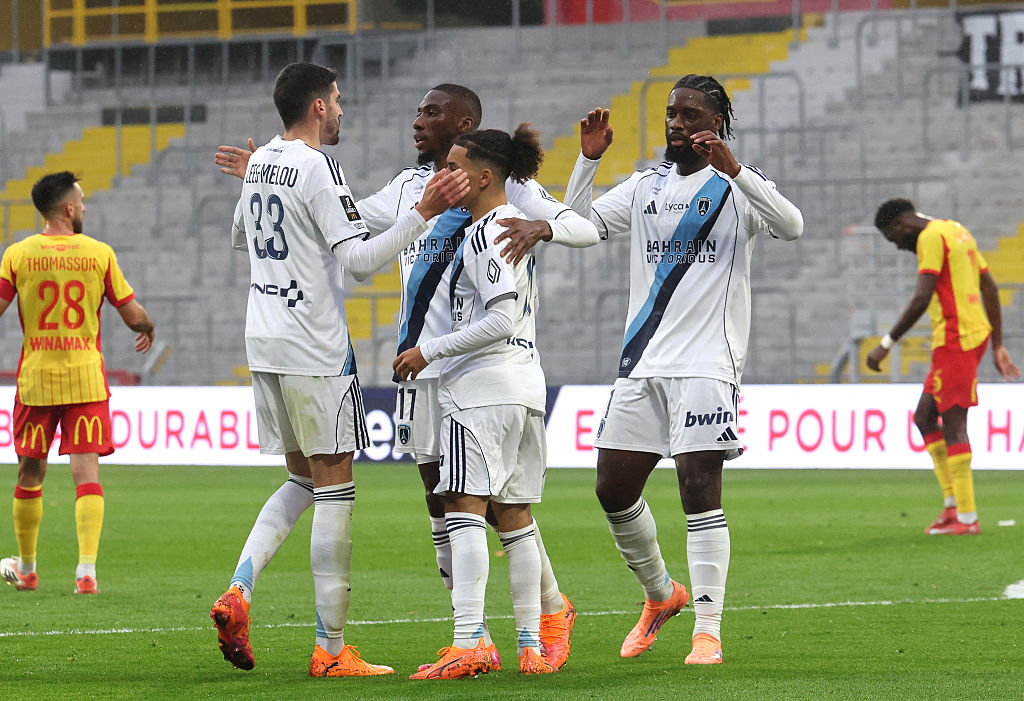 Paris FC&#039;s French midfielder #33 Pierre Lees-Melou (L) celebrates with teammates after scoring a goal during the French L1 football match between RC Lens and Paris FC at the Stade Bollaert-Delelis in Lens, northern France, on October 19, 2025.